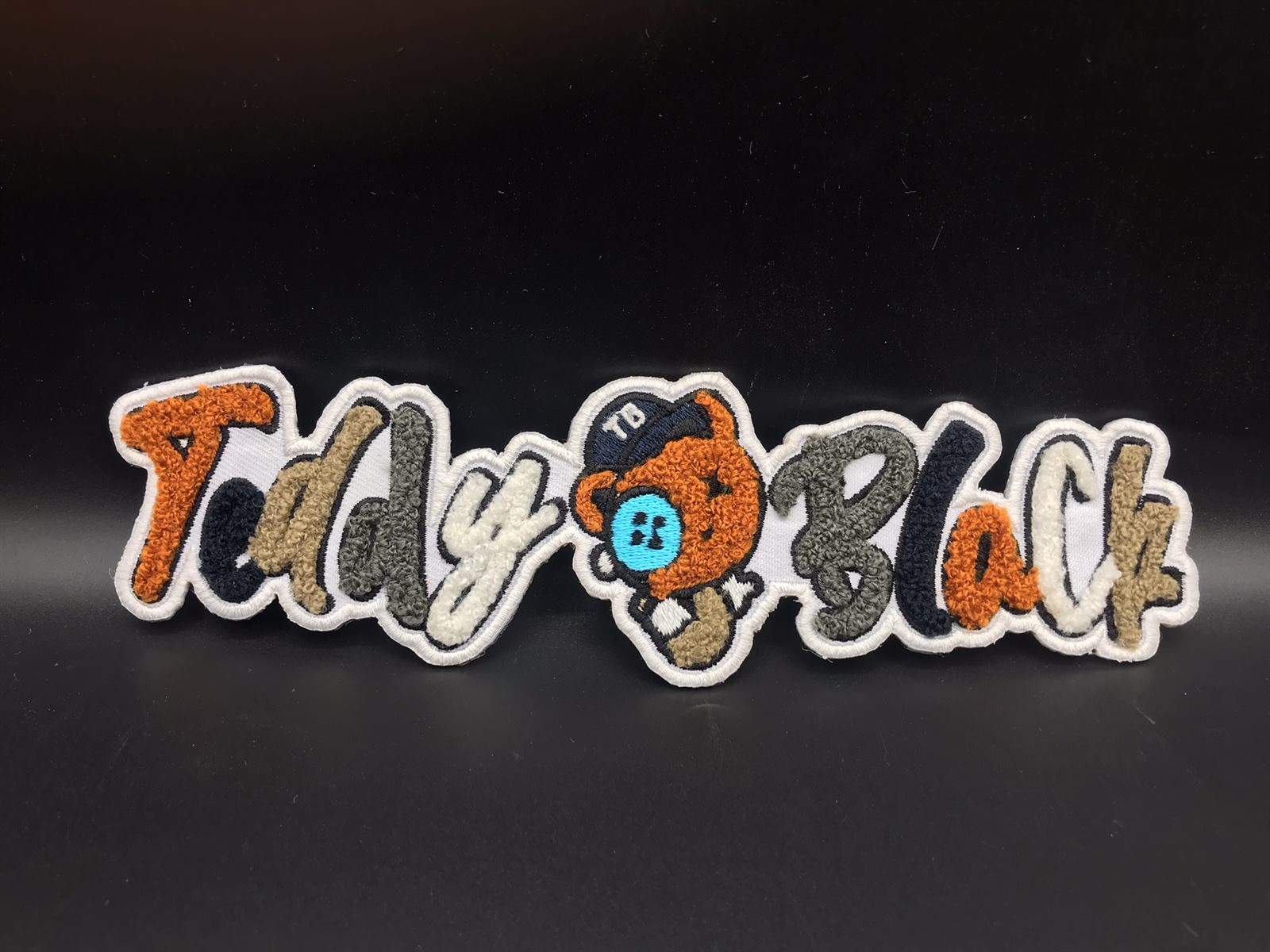 Custom patch production examples with vibrant colors and texture